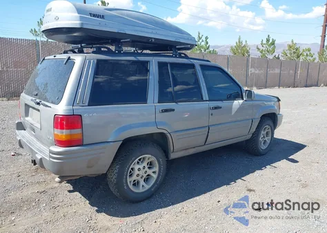 1997 Jeep Grand Cherokee Limited из США, поврежденный, VIN 1J4GZ78Y8VC714904